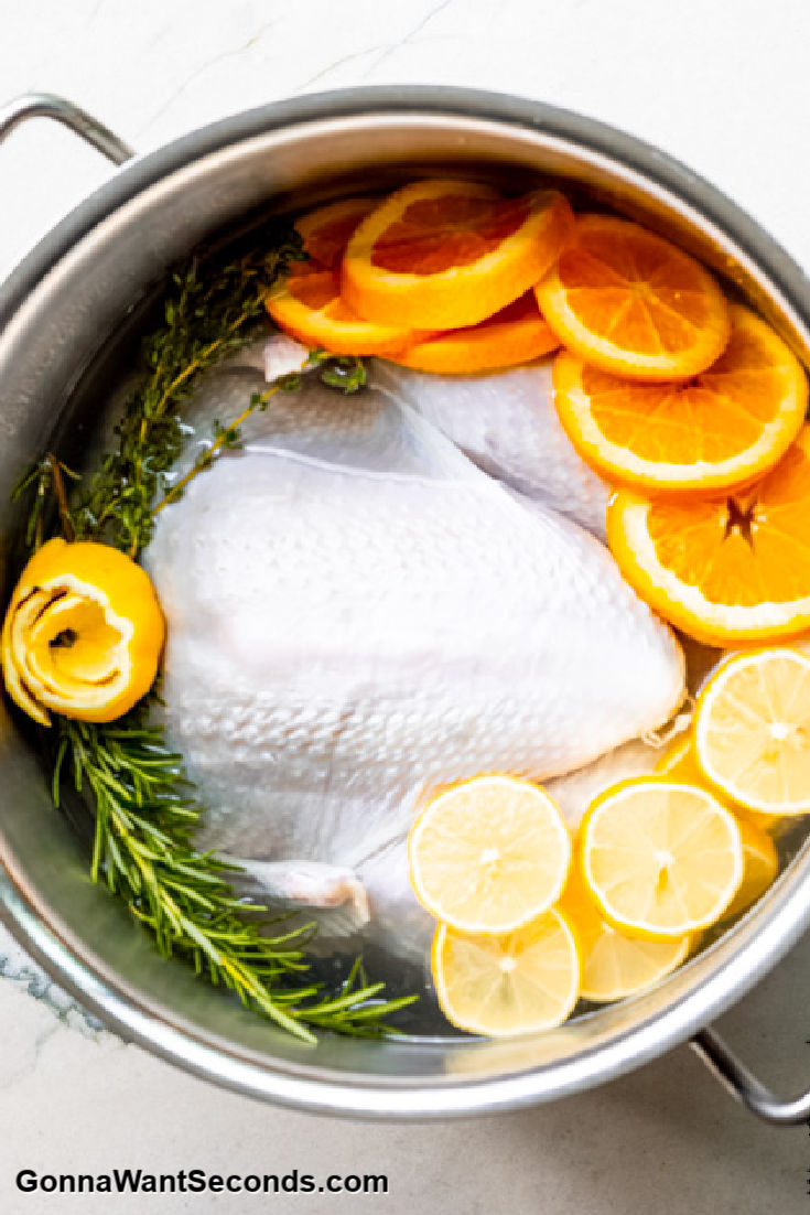 turkey brine with herbs and citrus in a pot