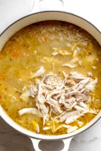 Step 14 how to make chicken and dumplings soup, Bring back the chicken to the pot.