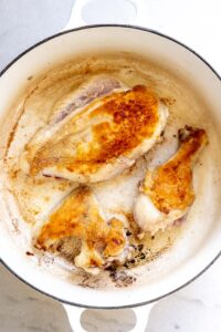 Step 3 how to make chicken and dumplings from scratch, Brown the chicken in batches on all sides. Set aside.