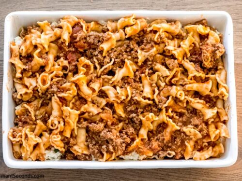 Step 9 how to make lasagna casserole, pour the remaining pasta over cheese layer