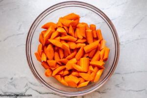 Step 1 how to make honey glazed carrots,Peel, trim, and slice the carrots.