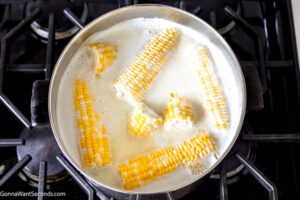 Step 3 how to make how to cook corn on the cob on the stove, Add the corn and simmer.