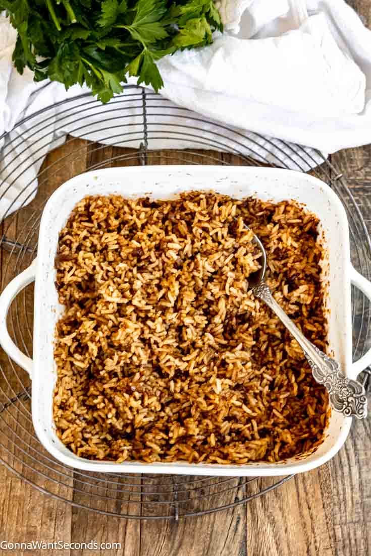Say hello to a savory, rich side dish called stick of butter rice. You won't believe how delicious a 4-ingredient recipe can be! #rice #sidedishes Stick of butter rice in a baking dish