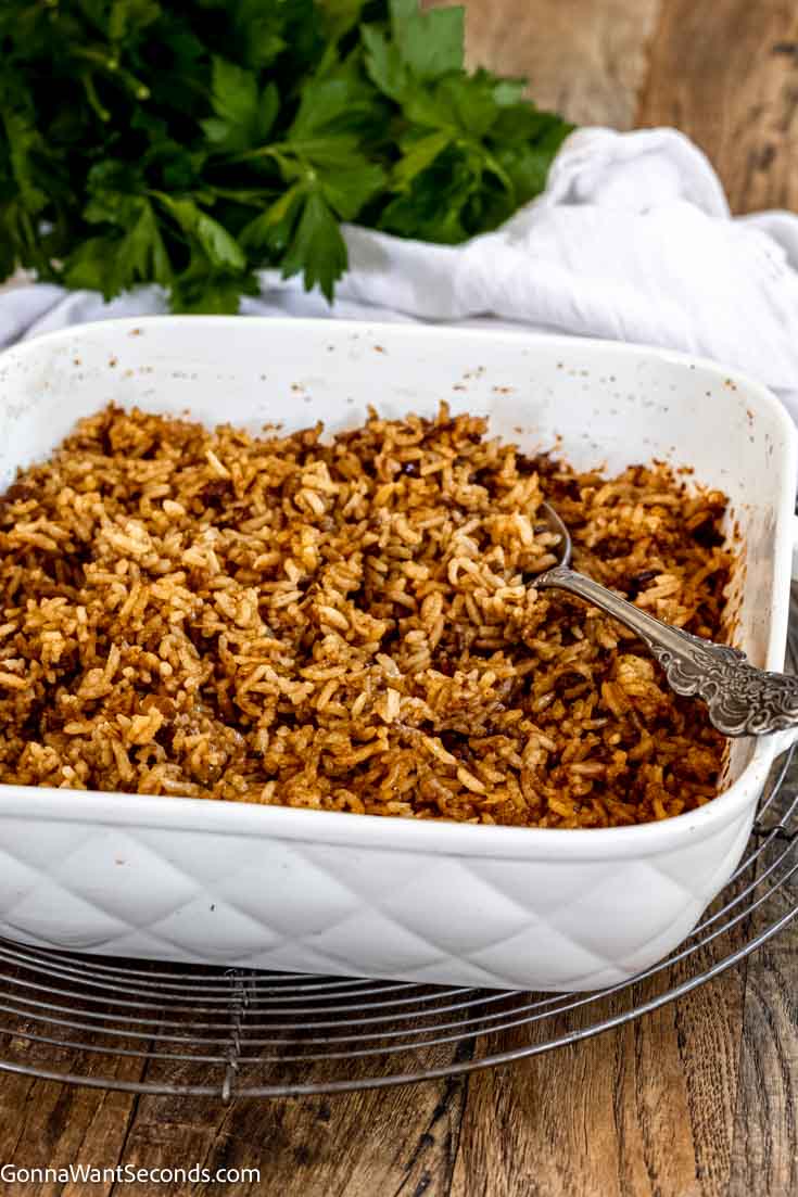Say hello to a savory, rich side dish called stick of butter rice. You won't believe how delicious a 4-ingredient recipe can be! #rice #sidedishes Stick of butter rice in a baking dish