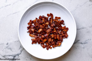 Step 1 how to make cracked out chicken tater tot casserole, Cook the bacon and set aside.