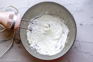 Step 2 how to make cream cheese fruit dip, mix with hand held mixer