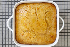 Step 7 how to make honey butter cornbread, As soon as the cornbread comes out of the oven, spread a layer of the honey butter over the top. Spread more layers once the first layer has been absorbed.