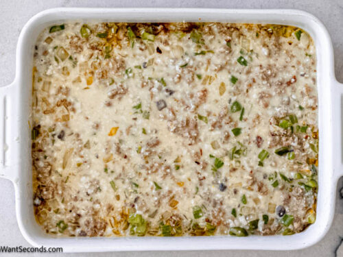Step 9 how to make sausage and rice casserole with cream of chicken soup, Mix and cover with foil. Bake.