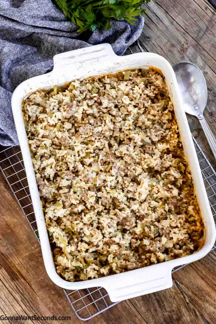 This quick and easy sausage and rice casserole has sausage, celery, onions, garlic, and rice all in a creamy chicken-based gravy. A perfect weeknight meal! #sausageandrice #sausageandricecasserole sausage rice cream of mushroom casserole top shot