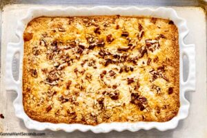 Step 6 how to make caramel apple dump cake with caramel sauce, Sprinkle the pecans over top. Bake.