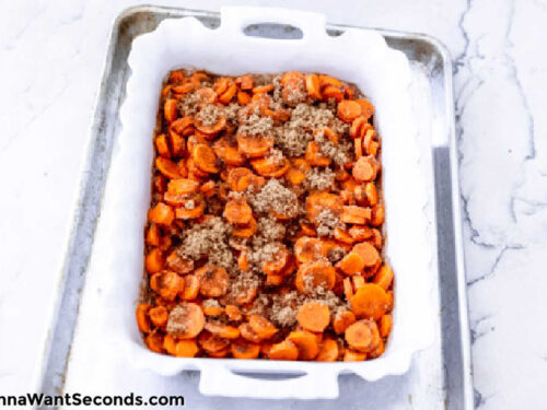 Step 4 how to make candied carrots, Add carrots and toss to coat. Sprinkle the brown sugar. Mix.