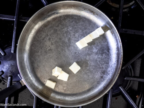 Step 1 how to make creamed peas, Melt the butter in a skillet.
