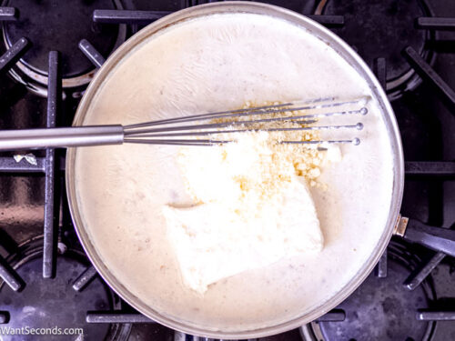 Step 6 how to make fresh creamed spinach, Add in the cream cheese and Parmesan.