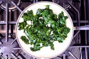 Step 8 how to make creamed spinach with cream cheese, Add the spinach.