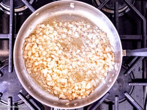 Step 3 how to make fresh creamed spinach, Saute the onions and shallots.