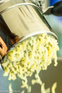 Step 3 how to make mashed potatoes, Put the potatoes through the ricer.