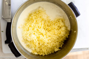 Step 5 how to make mashed potatoes, Pour in the cream and butter to the potatoes. Stir in the salt and pepper.