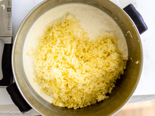 Step 5 how to make mashed potatoes, Pour in the cream and butter to the potatoes. Stir in the salt and pepper.