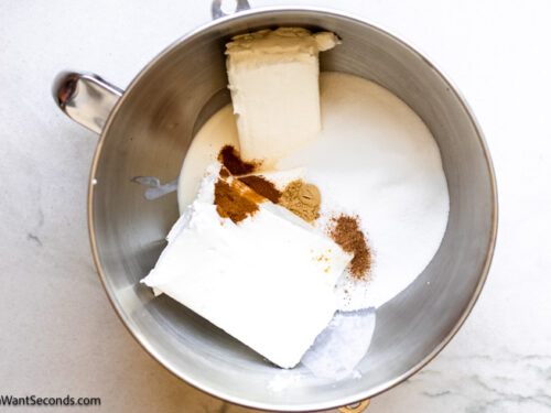 Step 5 how to make pumpkin cheesecake, Make Filling: Combine cream cheese, heavy cream, 1 1/4 cup sugar, cinnamon, ginger, and nutmeg.