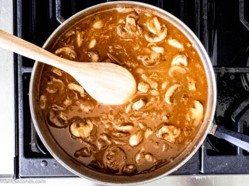 Step 7 how to make salisbury steak sauce, Make the gravy. Stir in the tomato paste, and sprinkle it with flour. Stir in the beef broth, dissolved bouillon, and sherry. Simmer.