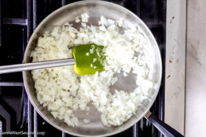 Step 1 how to make salisbury steak, Saute onion and garlic.