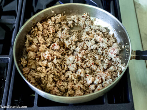 Step 1 how to make pizza casserole, Cook and crumble the sausage until there's no longer any pink. Set aside.