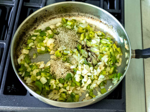 Step 2 how to make pepperoni pizza casserole, Saute the onions and bell pepper. Add the herbs, seasonings, and spices.