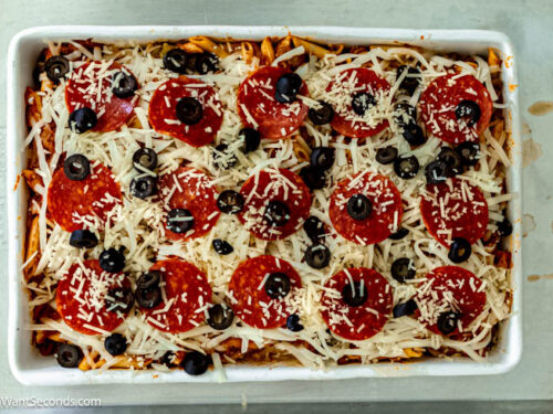 Step 4 how to make pizza bake casserole, Pour mixture into prepared baking dish. Cover with foil and bake.