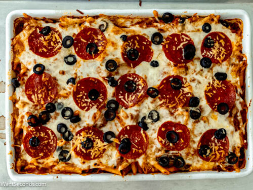 Step 5 how to make pizza casserole, Remove from oven and discard foil. Sprinkle mozzarella evenly over top of casserole. Return to oven and bake, uncovered.