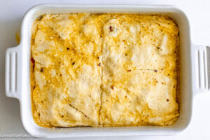 Step 10 how to make antipasto squares, Lay the other unrolled crescent roll dough over the meats and cheeses. Evenly brush the remaining egg mixture over the top. Bake covered with foil.