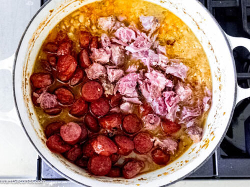 Step 9 how to make pinto bean soup, Return ham meat to soup pot. Remove and discard bay leaves.