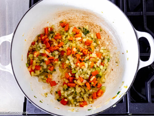 Step 2 how to make pinto bean and ham soup, In a pot, saute the veggies.