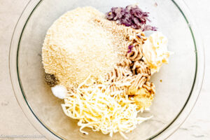 Step 1 how to make chicken burgers, Combine all the patty ingredients.