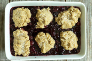 Step 8 how to make cherry cobbler, Drop spoonfuls of dough topping over the cherries.