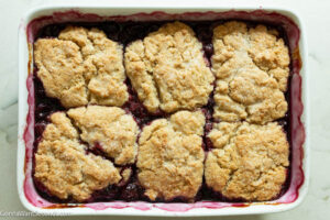 Step 9 how to make cherry cobbler, Sprinkle the dough with coarse sugar. Bake and serve.