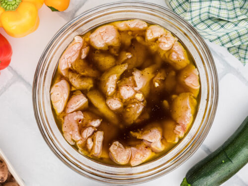 Step 2 how to make grilled chicken kabobs, Add the chicken pieces to the marinade mix. Refrigerate.