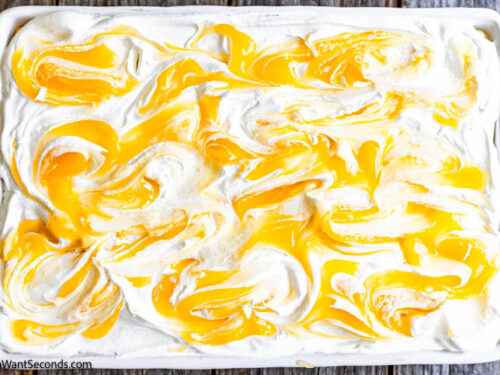 Step 12 how to make no-bake lemon icebox cake, Decoratively swirl the lemon curd. Cover with plastic wrap and refrigerate overnight and serve.