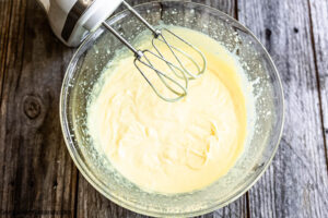 Step 3 how to make no-bake lemon icebox cake, Mix it with handheld electric mixer for 2 minutes.