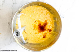 Step 5 how to make orange cake, Add orange juice and flour mixture, alternating, beginning and ending with flour. Stir in vanilla extract.
