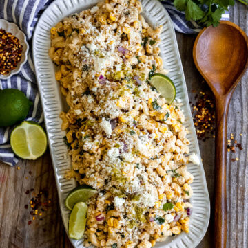 elote pasta salad on a serving platter