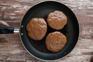 Step 6 how to make chocolate chip pancakes, Pour the pancake batter on the skillet.