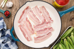 Step 1 how to make Okra and Tomatoes, Cook the bacon. Set aside.