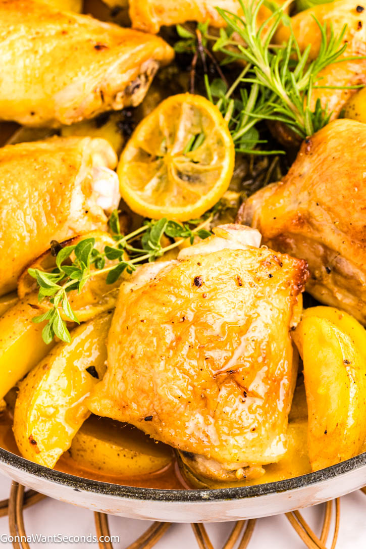 This Greek Lemon Chicken and Potatoes is a one-pan wonder—juicy chicken, tender potatoes, and bright lemon make an easy, cozy family dinner. #greekchicken #chickenandpotatoes Greek Lemon Chicken and Potatoes on a braising pan