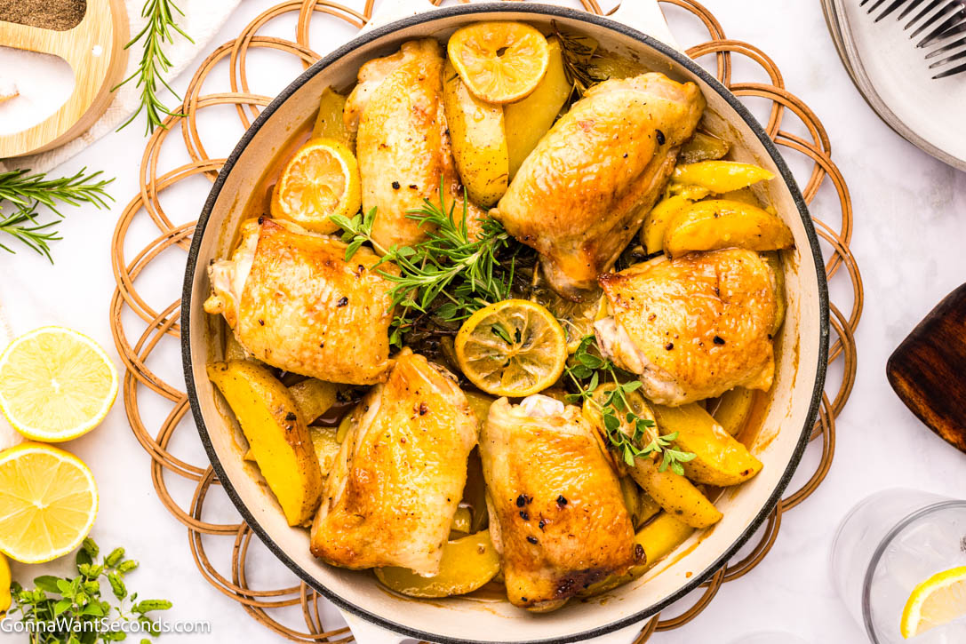 This Greek Lemon Chicken and Potatoes is a one-pan wonder—juicy chicken, tender potatoes, and bright lemon make an easy, cozy family dinner. #greekchicken #chickenandpotatoes Greek Lemon Chicken Thighs and Potatoes on a braising pan top shot