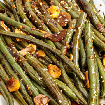 Asian Green Beans tossed with garlic, ginger, and a glossy soy glaze