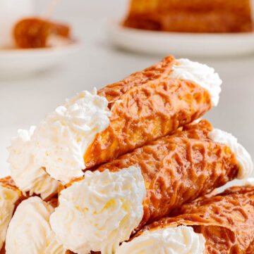 stacks of British Brandy Snaps with whipped cream inside