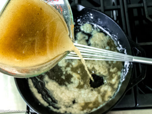 Step 9 how to make crockpot turkey breast boneless, Add the sieved turkey broth.