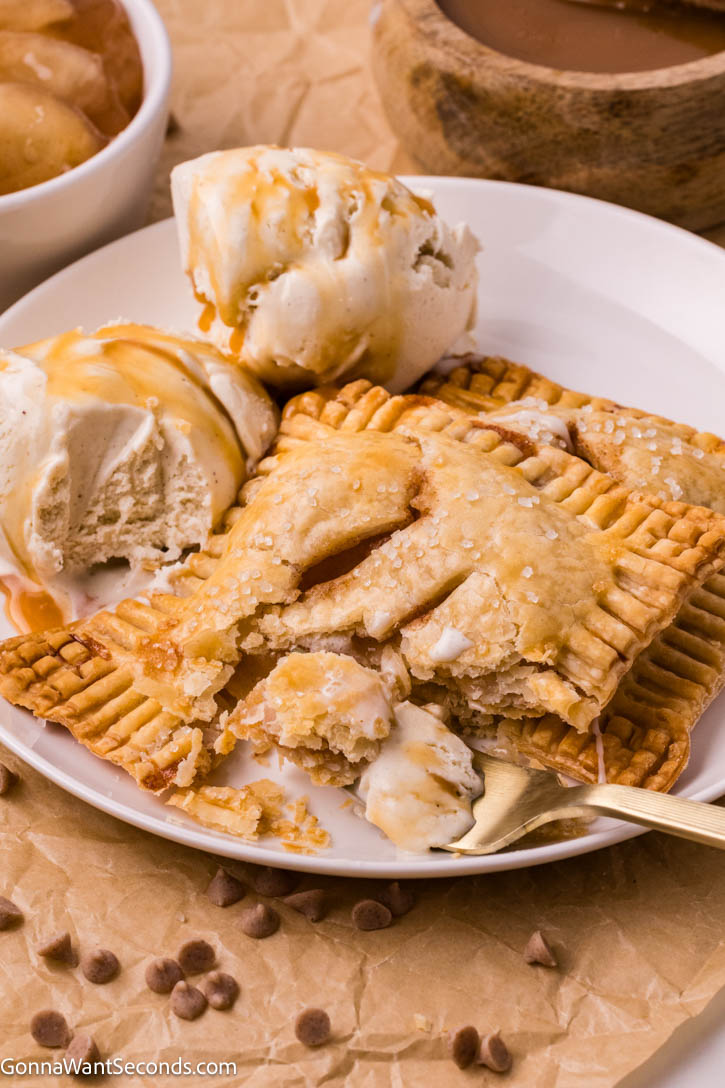 These easy hand pies are a master recipe for any filling — from Black Forest cherry to caramel apple! Flaky, simple, and ready in minutes. #handpies #easypies easy hand pies on a plate