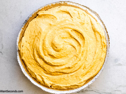 Step 7 how to make no bake pumpkin pie, Pour the mixture into the prepared crust.