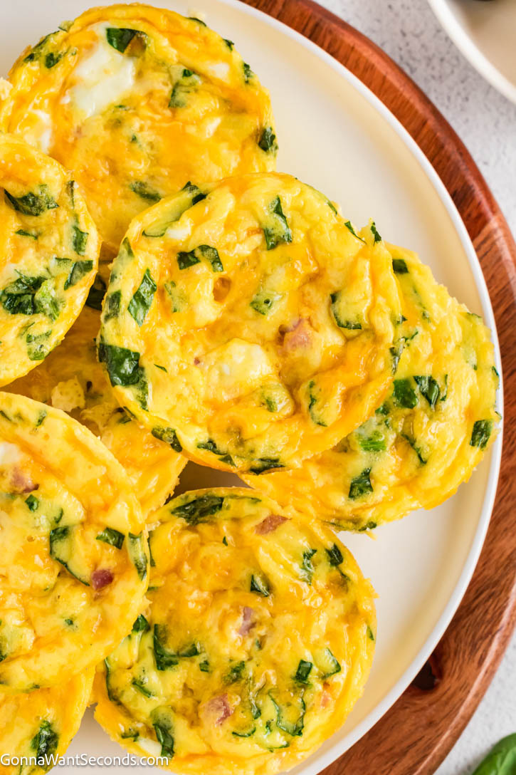 These easy breakfast egg muffins are fluffy, customizable, and perfect for meal prep. Make ahead, freeze, and reheat for busy mornings. #breakfastmuffins #eggmuffins meal prep breakfast egg muffins on a serving platter